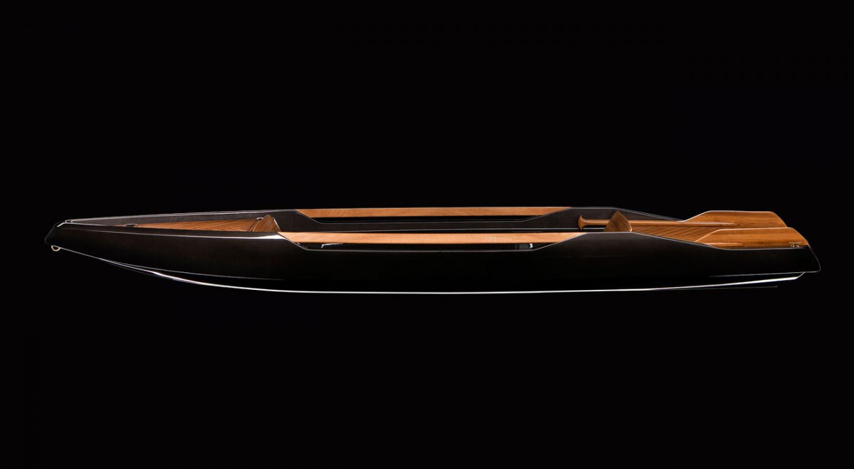 Luxury canoe made from carbon fiber and teak wood
